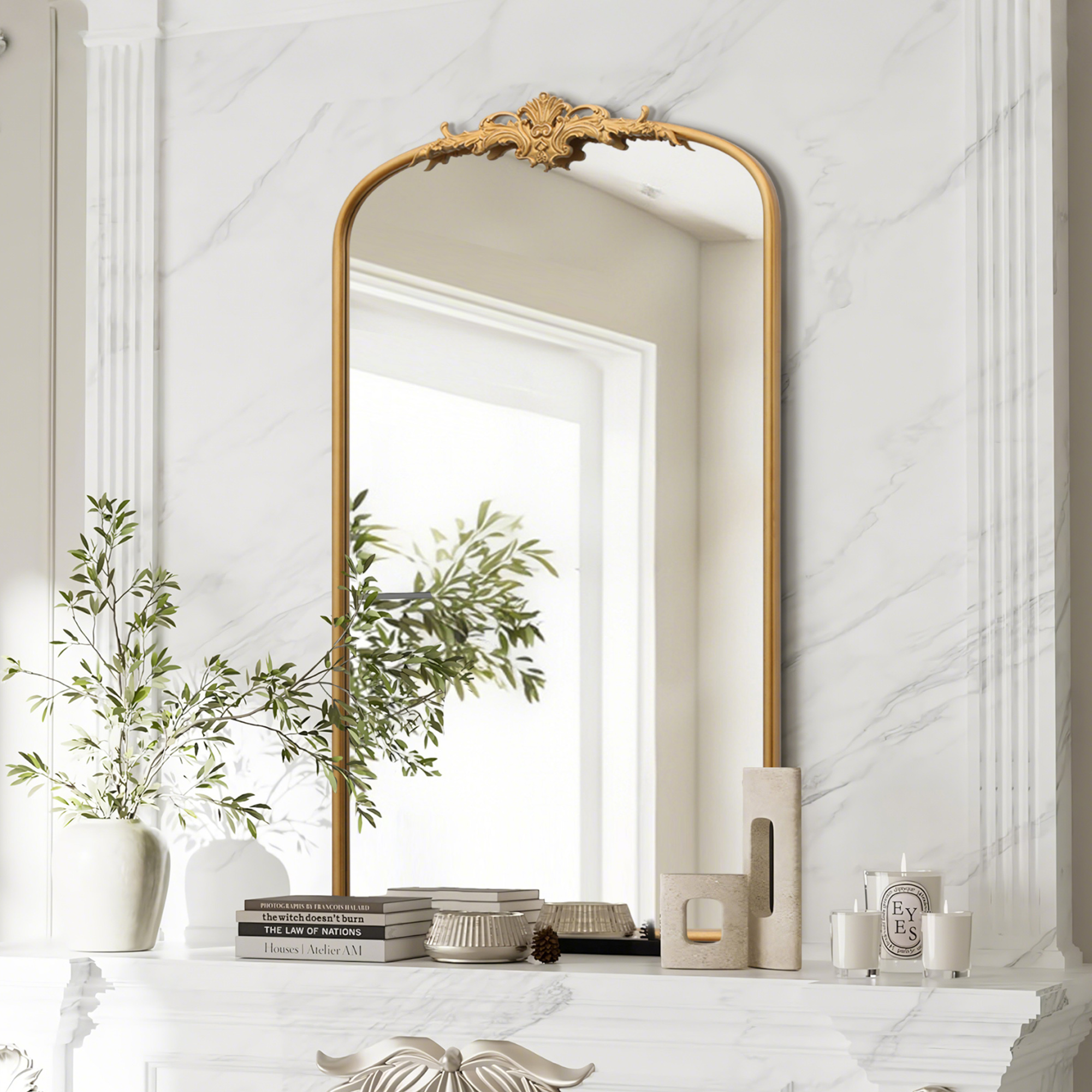 Antique Arch Bathroom Victorian Mirror Collection reflecting natural light in a stylish entryway setting